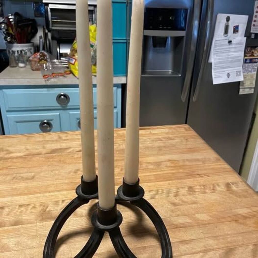 Vintage handmade horseshoe crafted candlestick